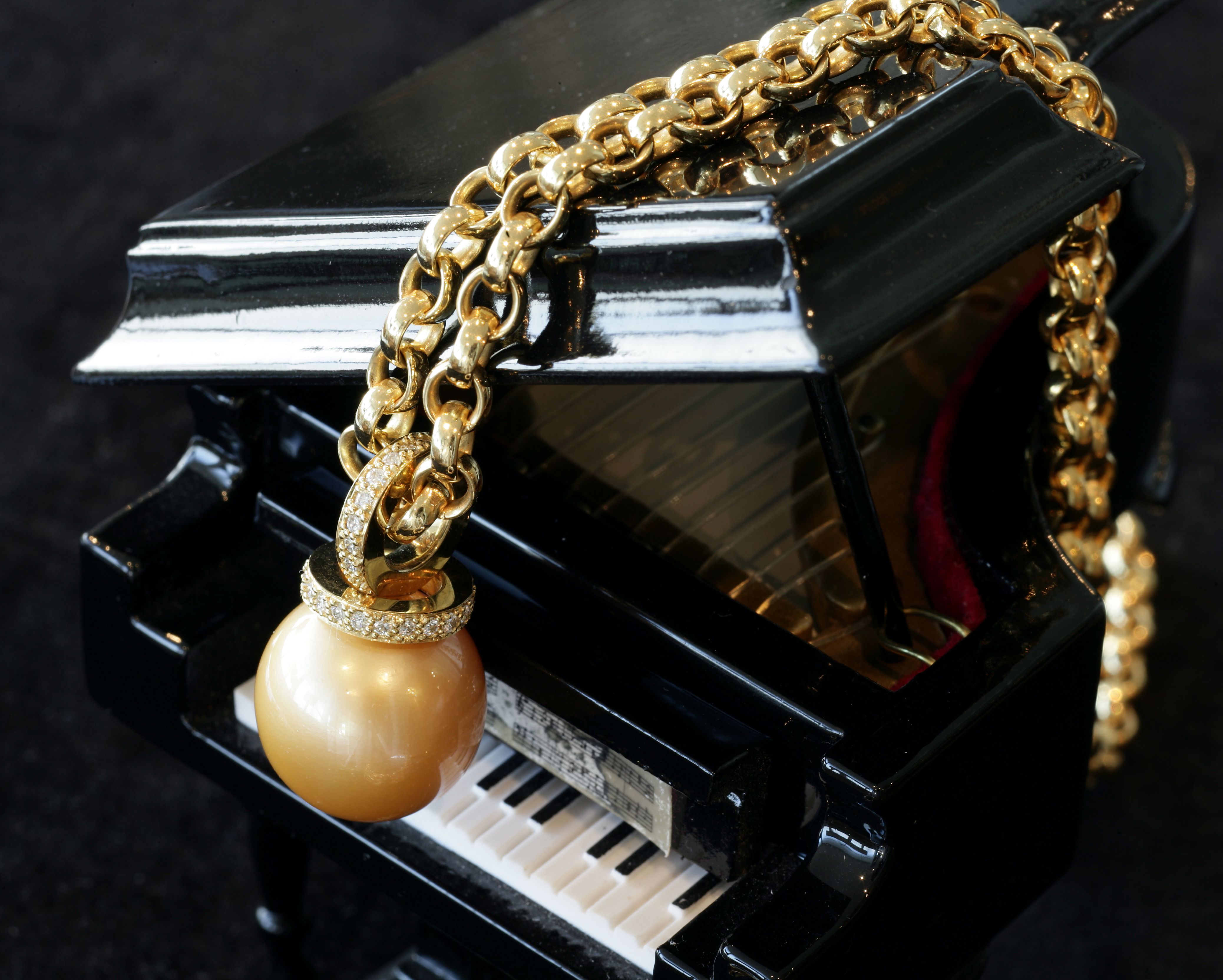 Pearl necklace on piano.jpg